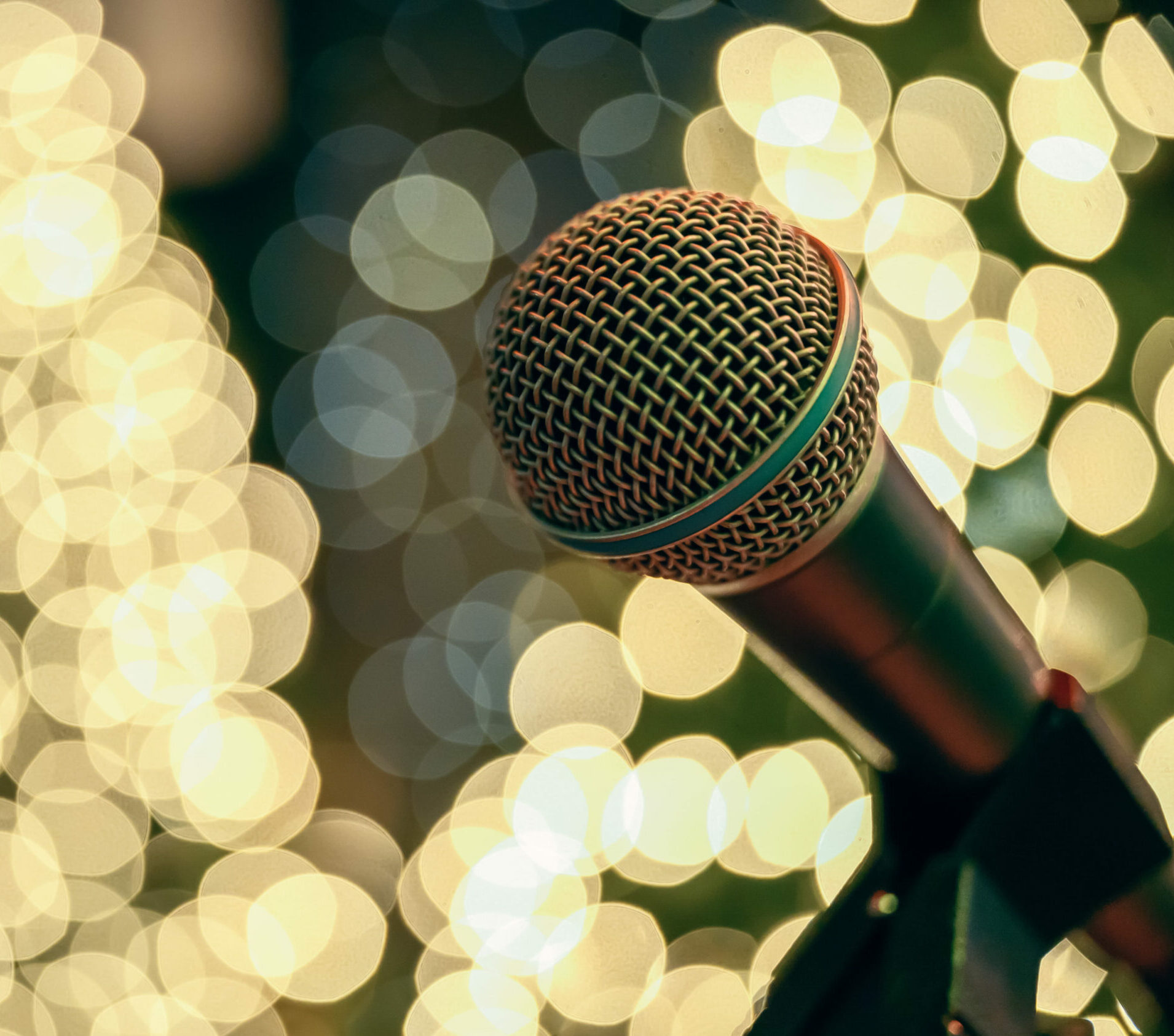 A microphone isolated on a white bokeh background