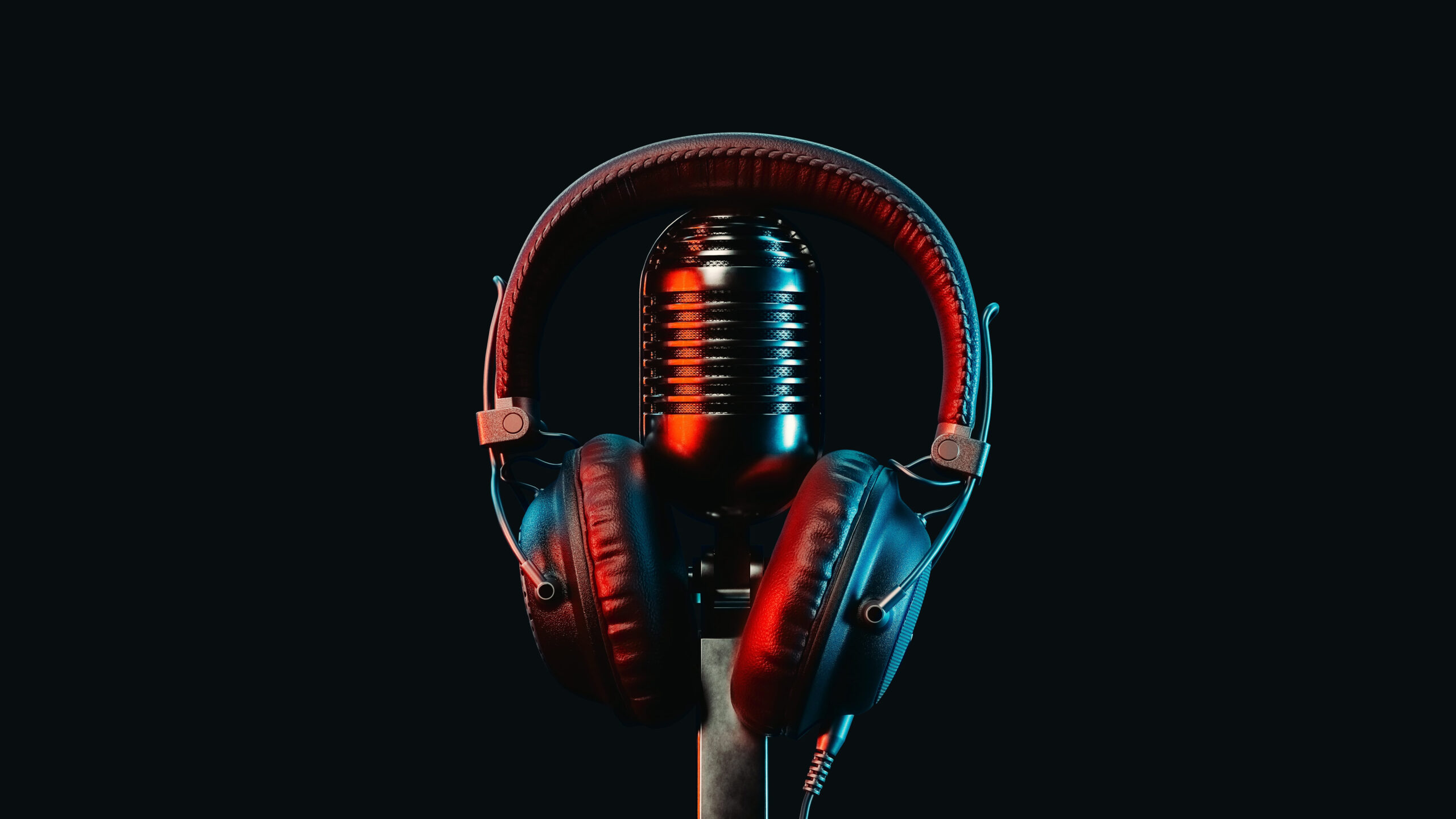 Vintage microphone and headphones side by side on a black background. 3d, rendering, illustration,